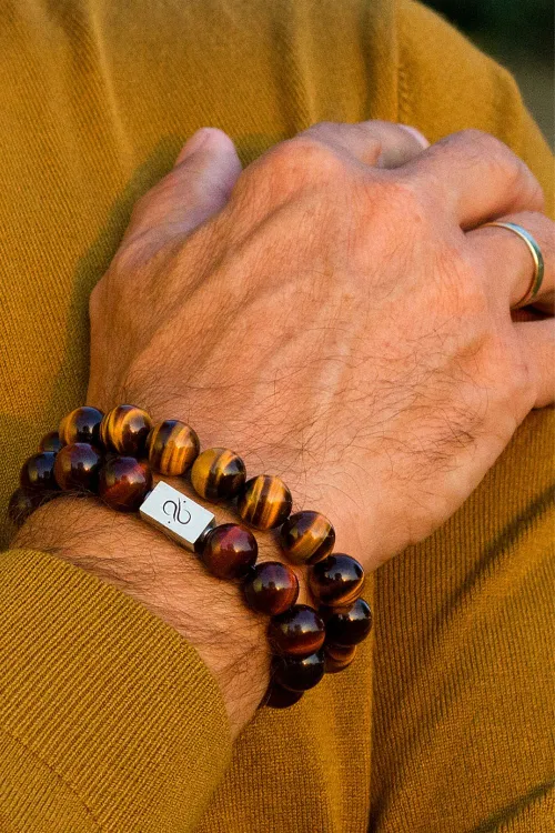 Bezel-set Tiger's Eye ring demonstrating protective settings