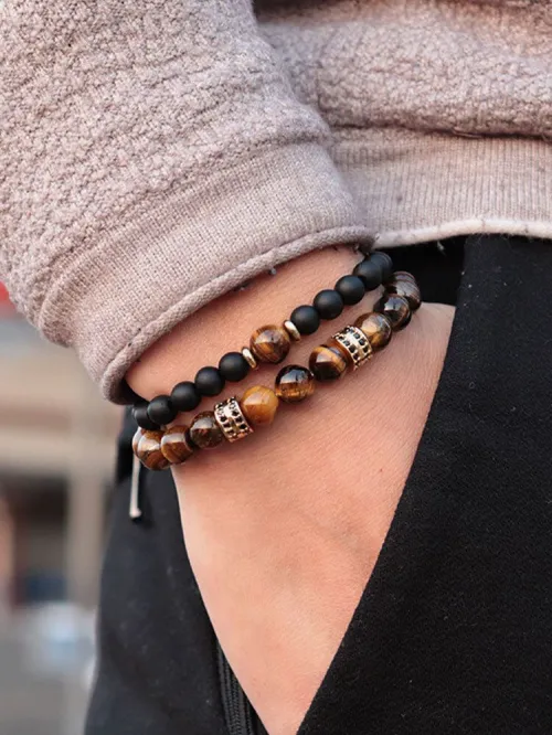 Comparison of natural vs heat-treated tiger's eye showing color differences